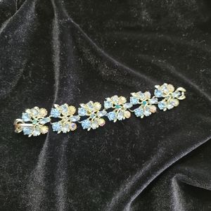 Gorgeous vintage rhinestone bracelet. Pale gold and blue, gold finish, 7".